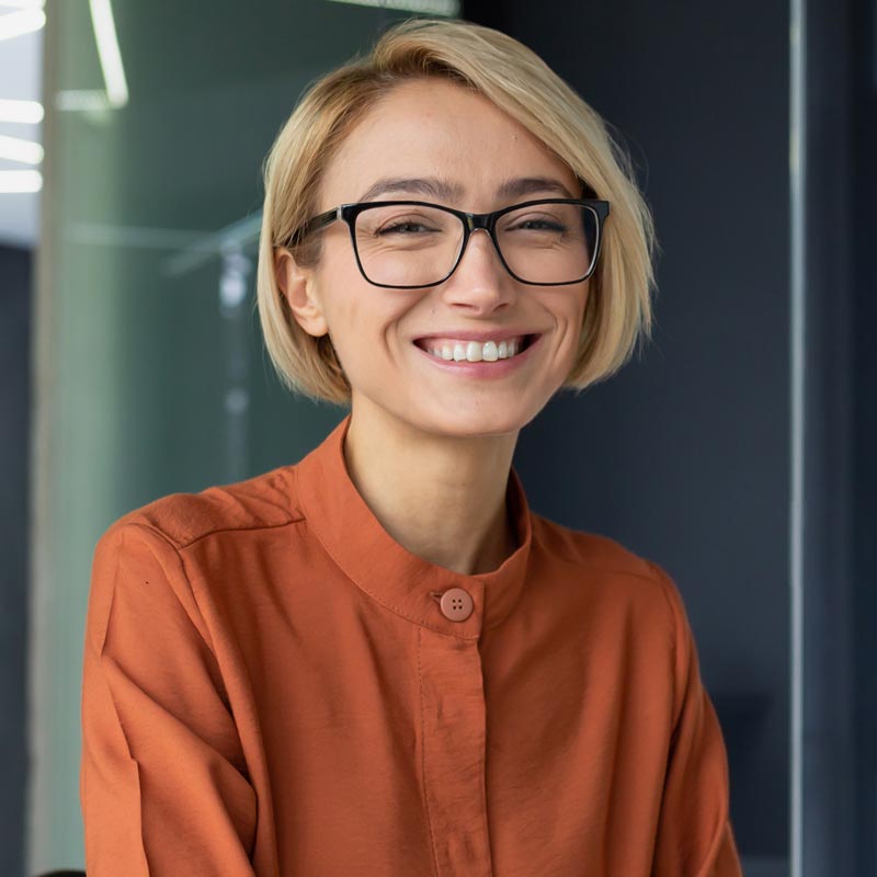 Portrait of happy and successful female programmer 2023 03 10 22 23 10 utc.jpg